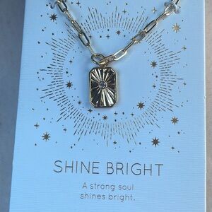 Gold Toned Pendant Necklace with Starburst Design